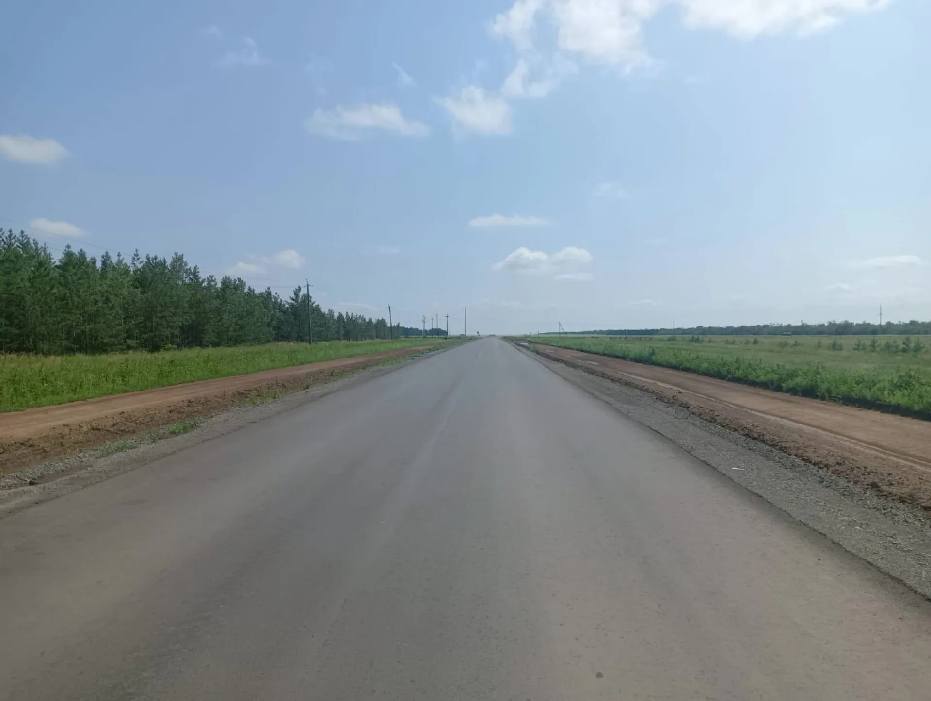 Новую дорогу укладывают в Немецком национальном районе Новую дорогу укладывают в Немецком национальном районе